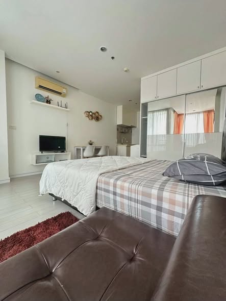 living room and bedroom of TC-Green Condominium