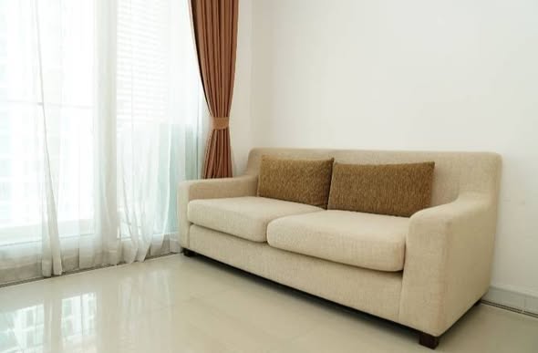 living room and bedroom of TC-Green Condominium