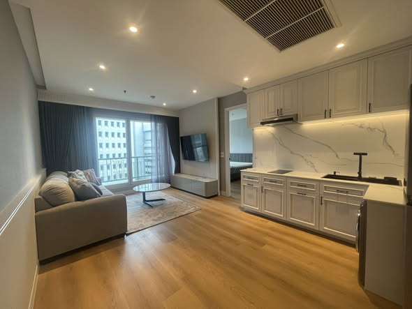 living room and kitchen of The Address Chidlom