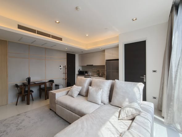 living room and bedroom of The Bangkok Sathorn