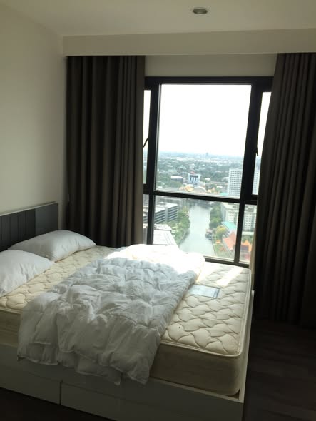 bedroom of THE BASE Park West – Sukhumvit 77