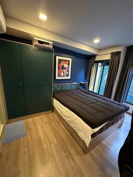 bedroom and room interior of THE BASE Sukhumvit 50