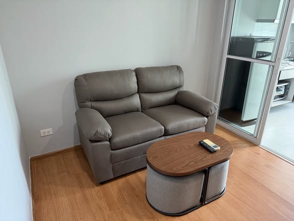 living room of THE BASE Sukhumvit 77