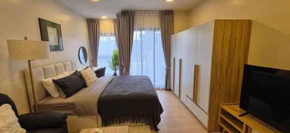 bedroom of The Base Urban Rama9