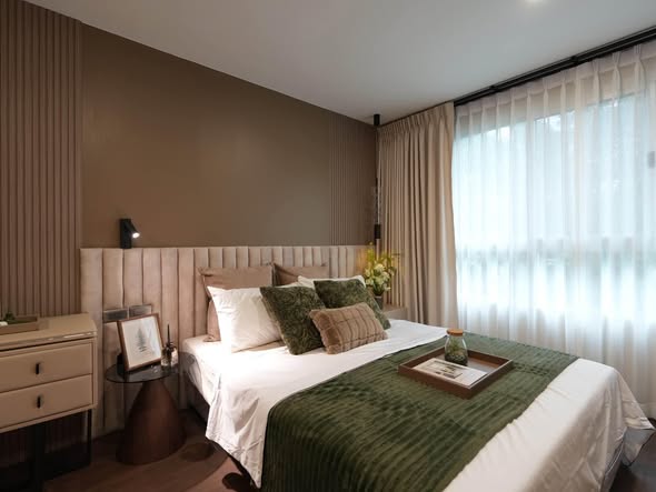 bedroom and bathroom of The Clover