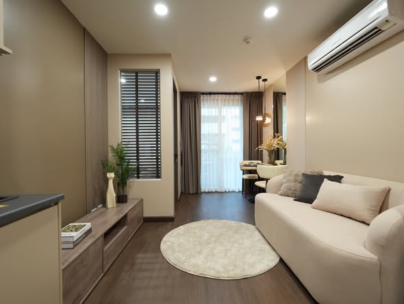 bedroom and living room of The Clover