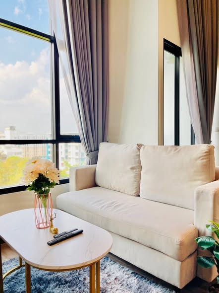 living room of The Collect Ratchada 32