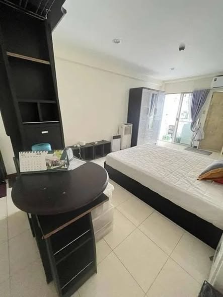 bedroom of The Color Living Hotel