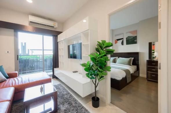 bedroom and living room of The Crest Sukhumvit 34