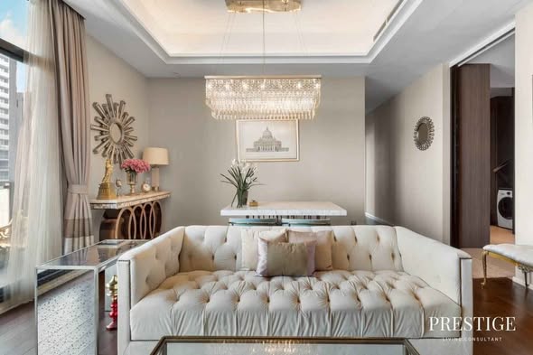 bedroom and living room of The Diplomat 39
