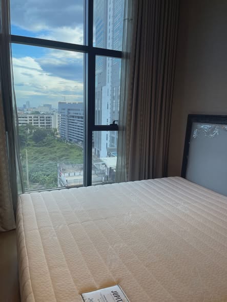 bedroom of The Diplomat Sathorn