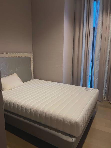 bedroom of The Diplomat Sathorn