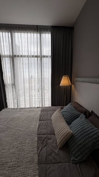 bedroom of The Diplomat Sathorn