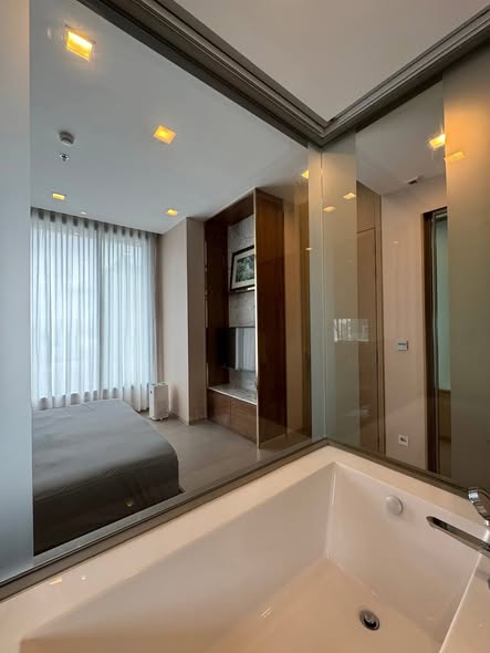 bedroom and bathroom of THE ESSE ASOKE