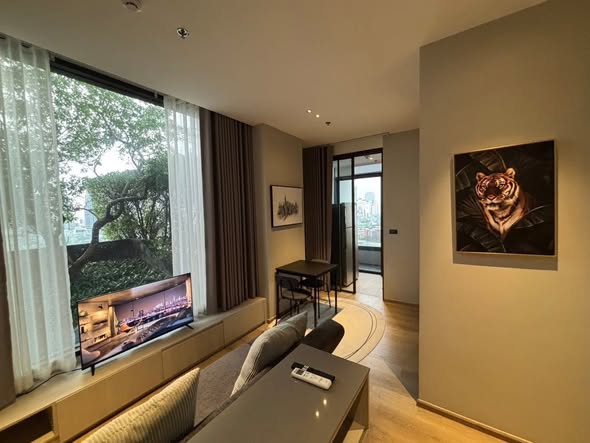 living room and bedroom of The Fine Bangkok