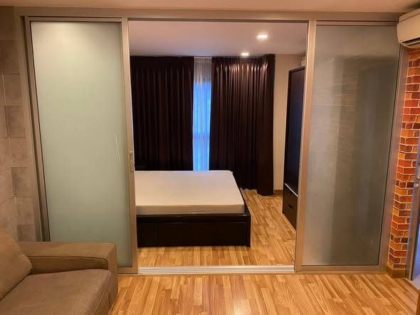 bedroom and room interior of The Green Condo III