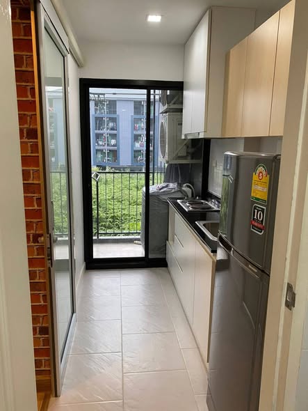 room interior and kitchen of The Green Condo III