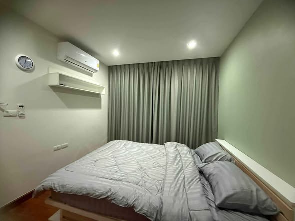 bedroom of The Happy Place Condominium