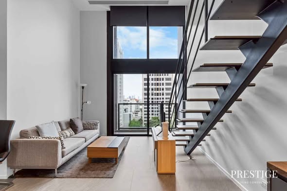 living room of The Lofts Silom by Raimon Land