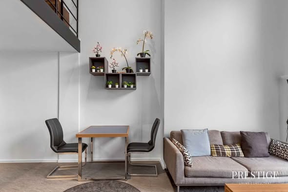 living room of The Lofts Silom by Raimon Land