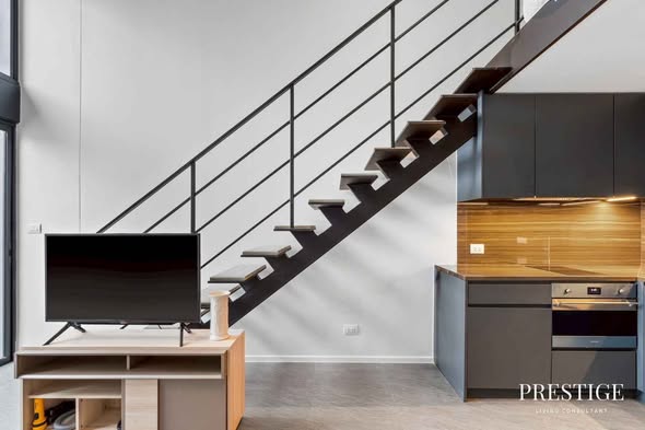 living room of The Lofts Silom by Raimon Land