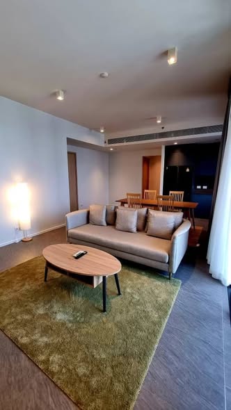 living room and bedroom of The Lofts Silom by Raimon Land