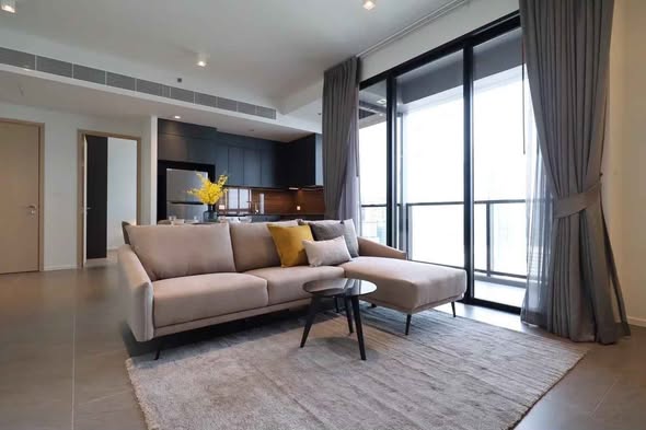 living room and bedroom of The Lofts Silom by Raimon Land