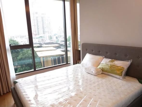 bedroom of The Lumpini 24