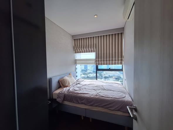 bedroom of The Lumpini 24