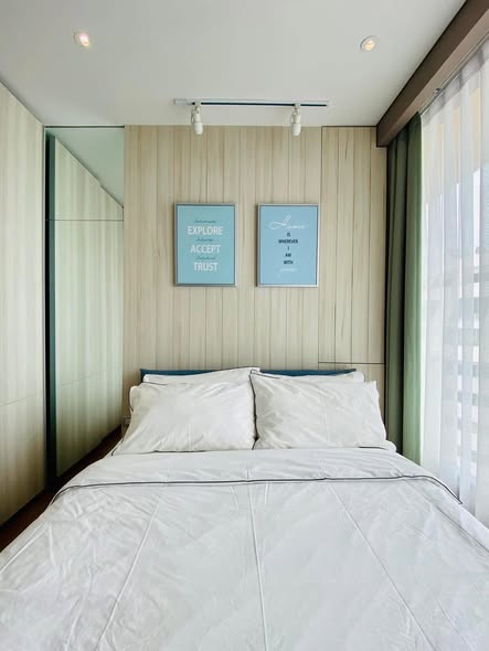 bedroom of The Lumpini 24