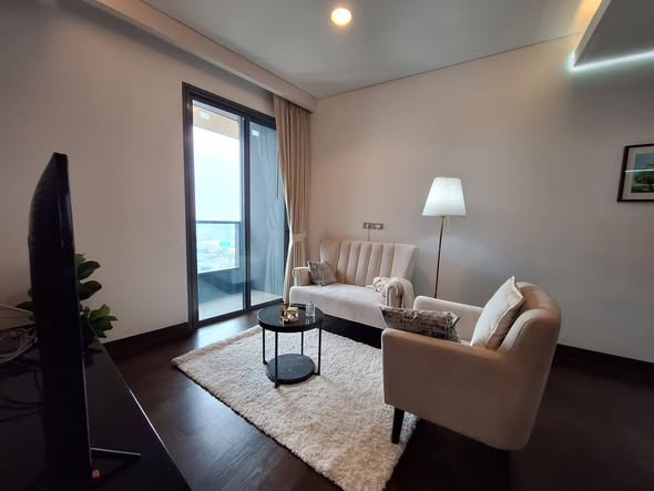 bedroom and living room of The Lumpini 24