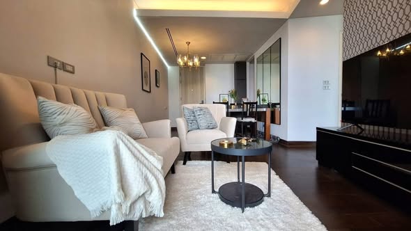 living room and bedroom of The Lumpini 24