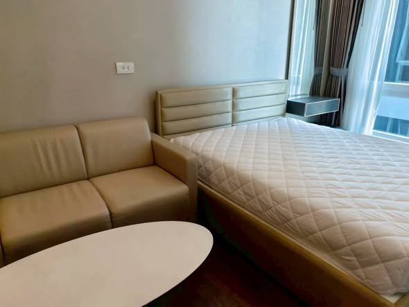bedroom of The Metropolis Samrong