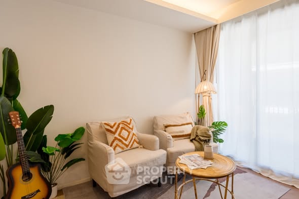 bedroom and living room of The Nest Ploenchit
