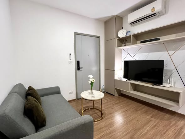 living room and bedroom of The Origin Ram 209 Interchange