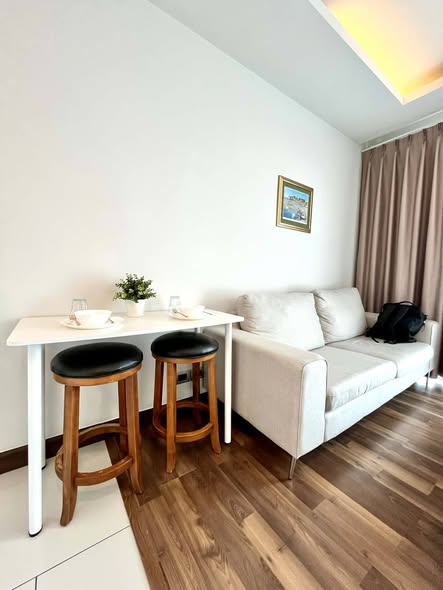 bedroom and living room of The Peak Towers