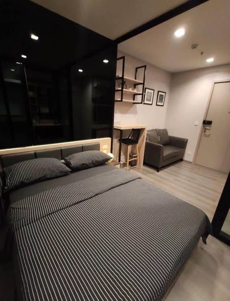 living room and bedroom of The Politan Rive