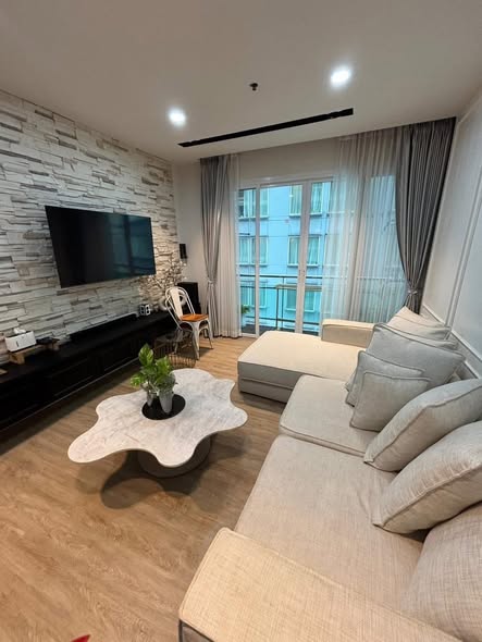 living room and bedroom of The Prime 11 Condo