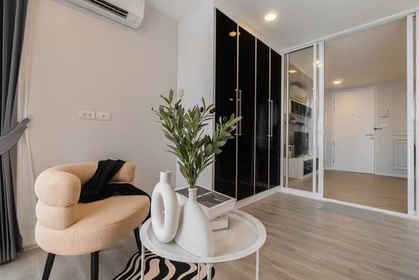 living room and bedroom and room interior of The Raffles Condominium