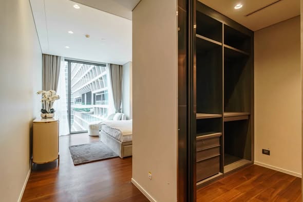 bedroom and room interior of The Residences at Sindhorn Kempinski Hotel Bangkok