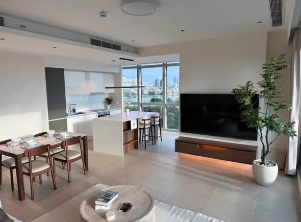 living room and kitchen of The River Condominium