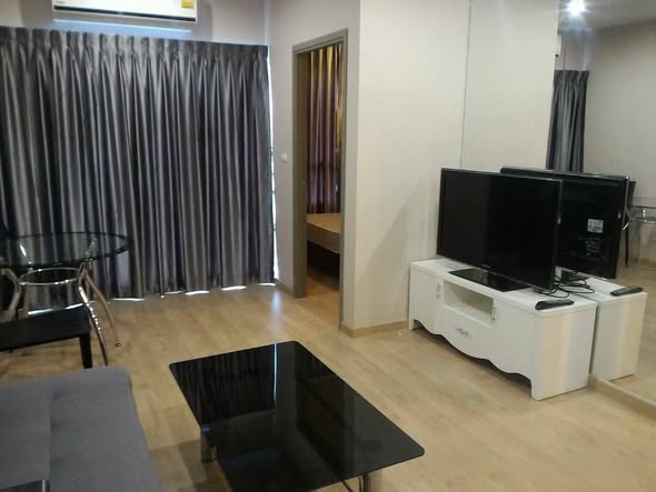 living room and bedroom of The Tempo Grand Sathon-Wutthakat