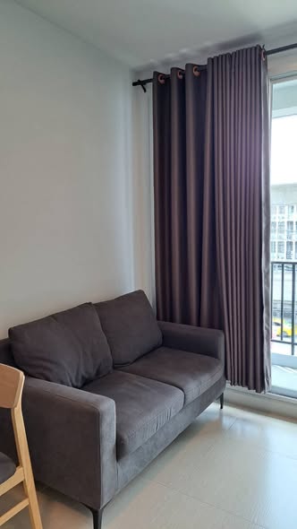 bedroom and living room of The Ville Express
