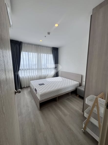 bedroom of The Win Condominium
