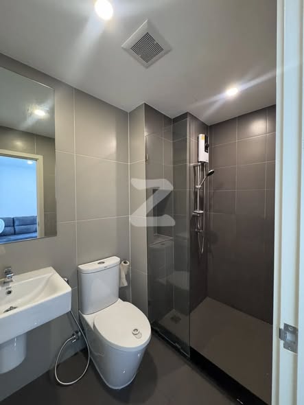 room interior and bathroom of The Win Condominium