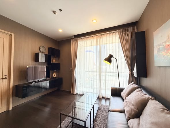 living room and bedroom of THE XXXIX