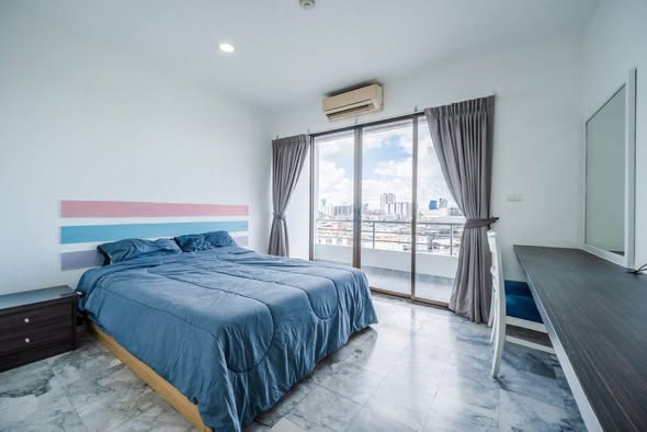 bedroom of T.I.T. Tower Apartment Service