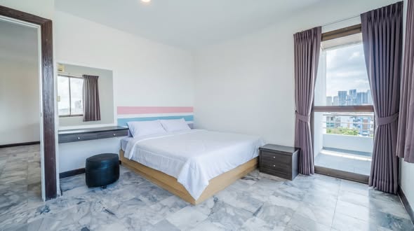 bedroom of T.I.T. Tower Apartment Service
