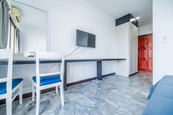 bedroom of T.I.T. Tower Apartment Service