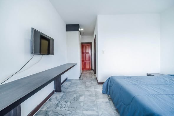 bedroom of T.I.T. Tower Apartment Service